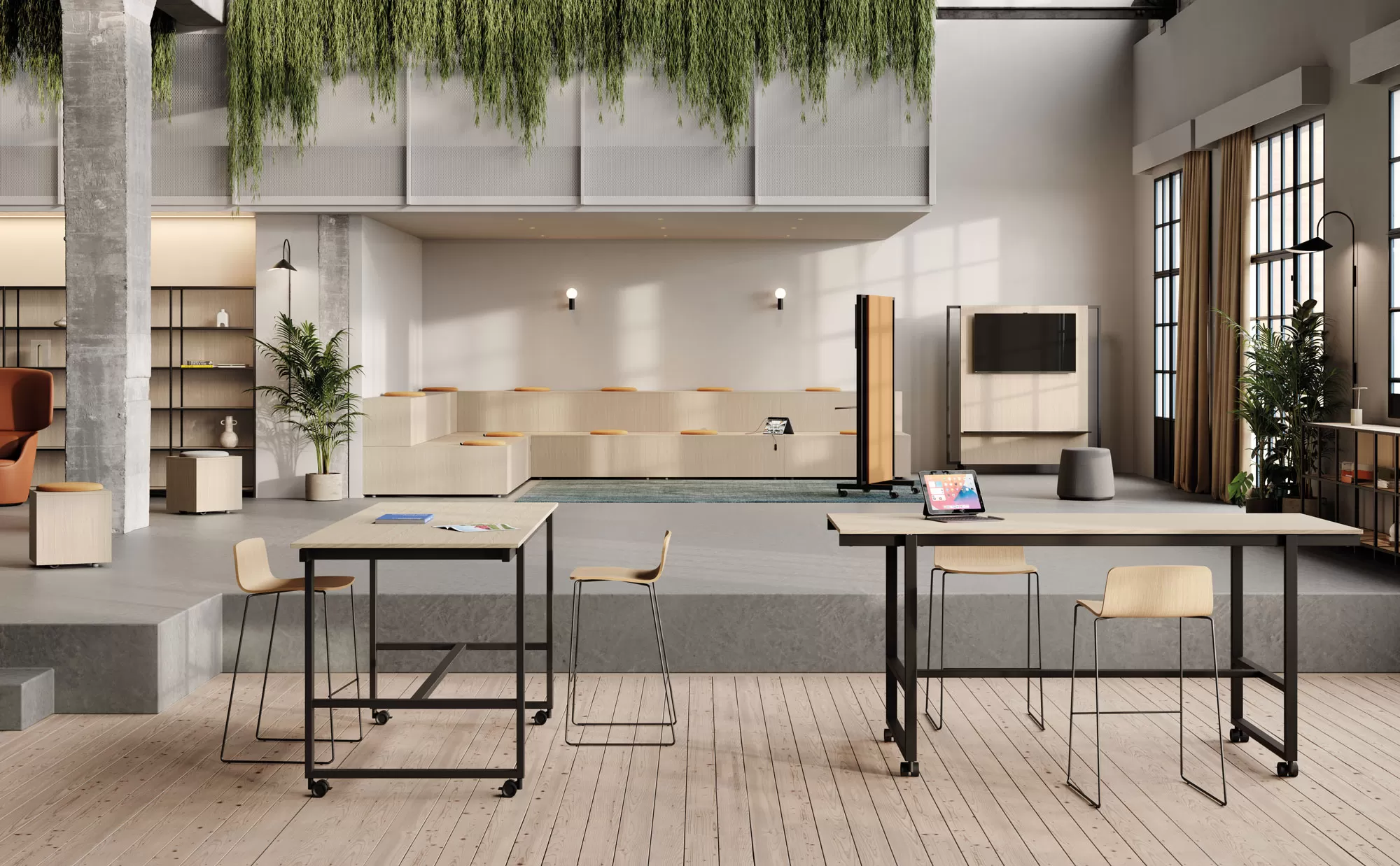 tavoli e scrivanie di design con ruote in un ufficio