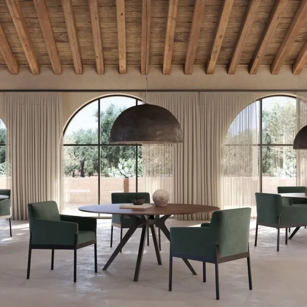 Green Stand By Armchair lounge chairs in a restaurant with round tables