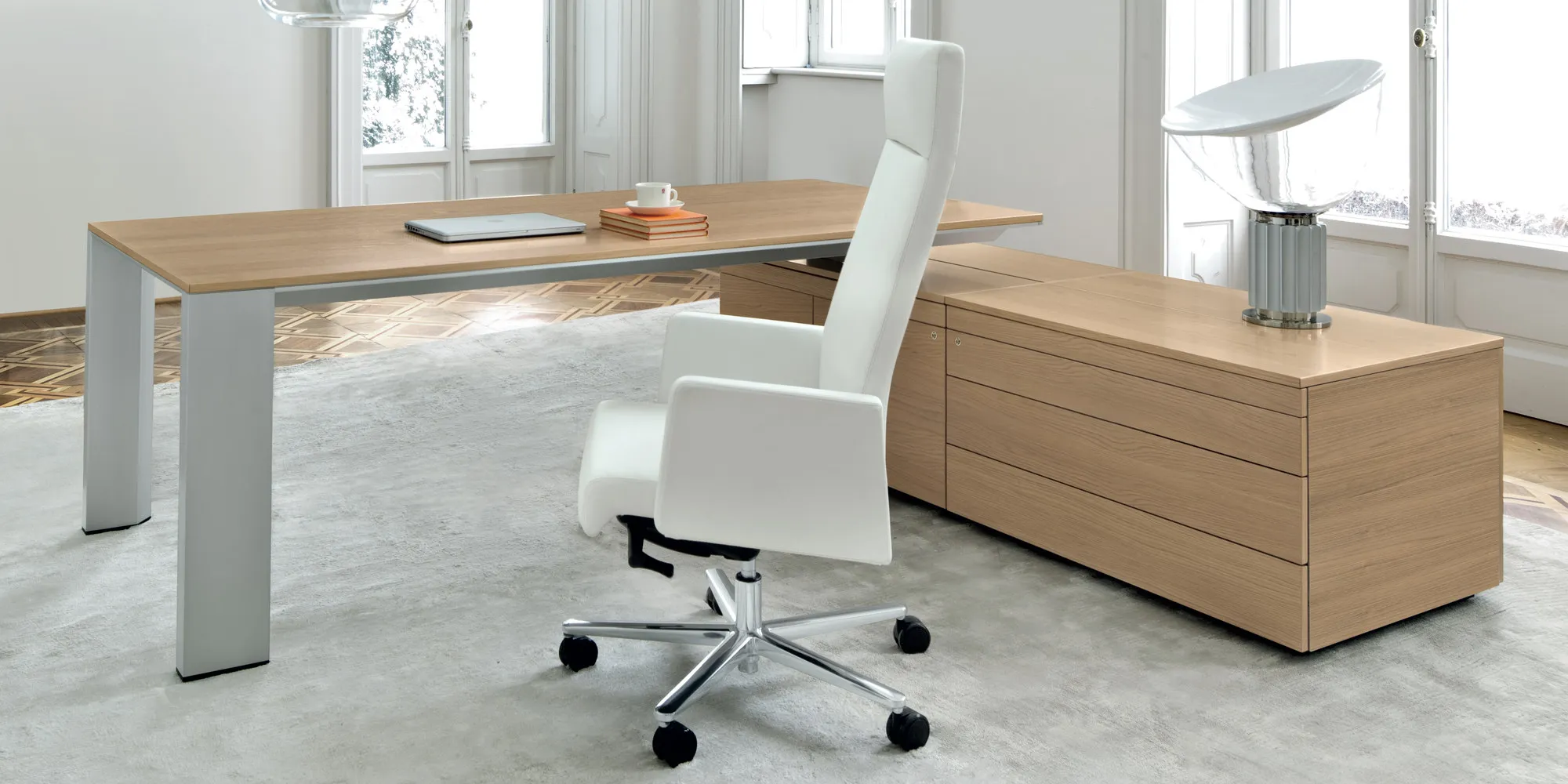 Max executive office chairs in white leather in an executive office