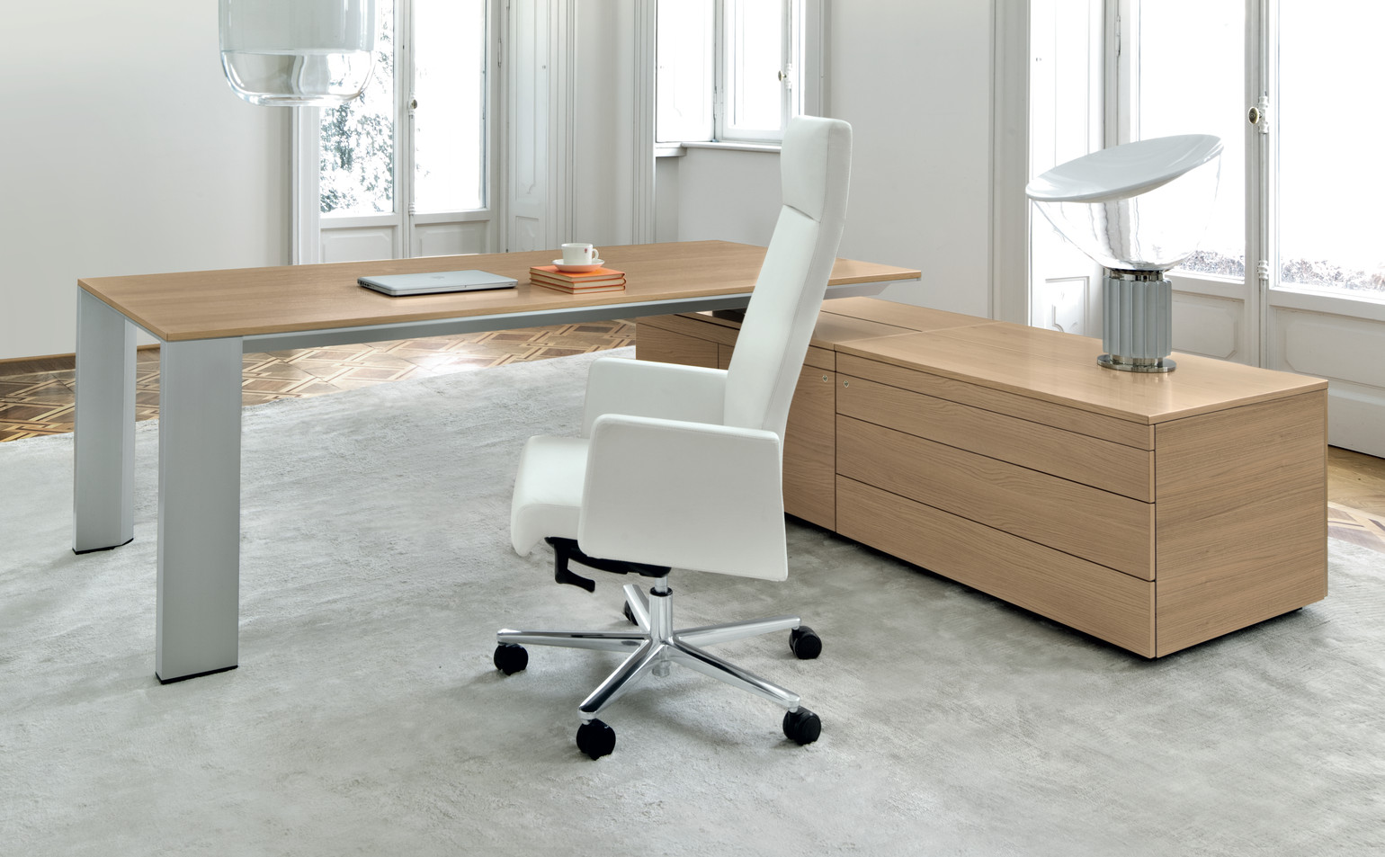 Max executive office chairs in white leather in an executive office