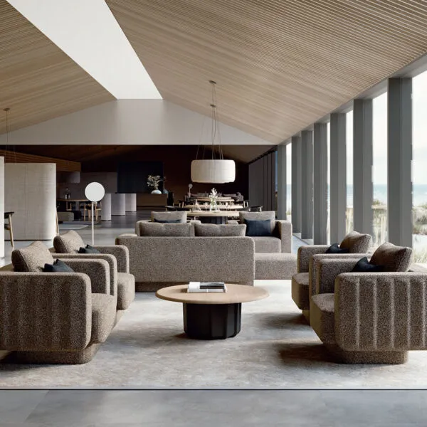 Sabree Italian modern furniture design collection: sofas, armchairs and coffee table in greige boucl&eacute; fabric in a resort lounge with wooden ceiling and seaside view &mdash; Frezza