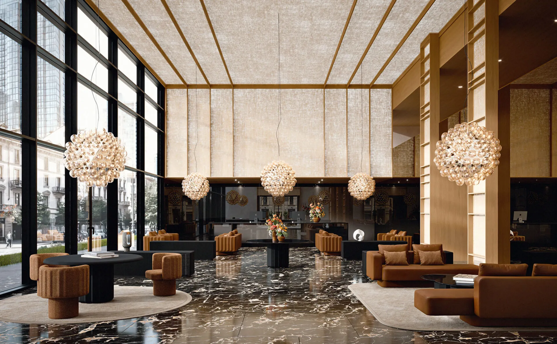 Collezione Sabree con divani e poltrone di design in pelle cognac disposti in hotel lobby di lusso con pavimento in marmo e lampadari a sfere — contract italiano