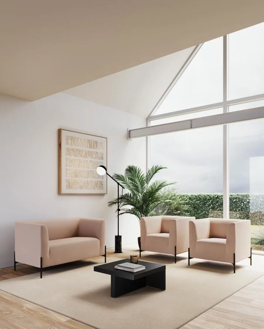 Clint two-seater sofa and two armchairs in powder-pink fabric on black feet, around a black coffee table in a bright waiting area with a large window
