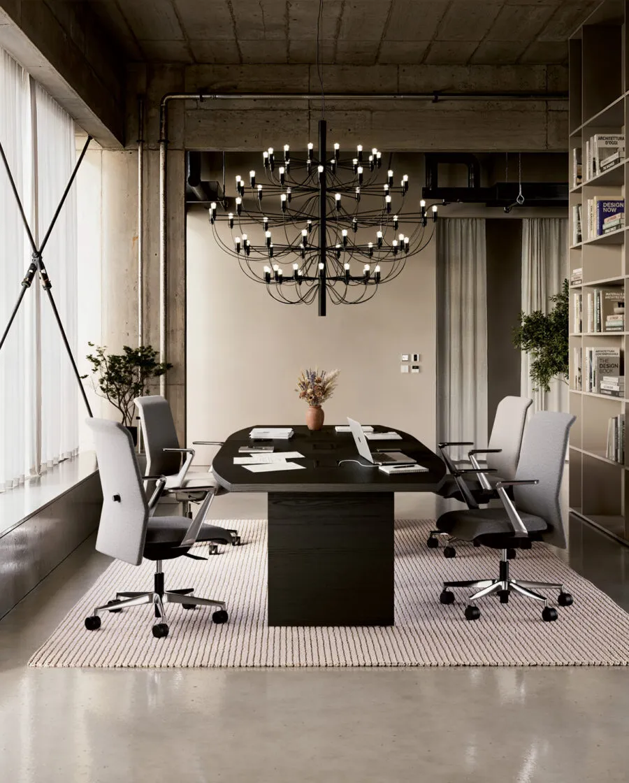 Four Deva Premium premium office chairs with polished aluminium armrests and base, in a Frezza meeting room
