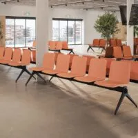 Yo Upholstered Bench upholstered waiting benches for 5 people in terracotta fabric, steel beam and black inverted V legs, in a large Frezza waiting area